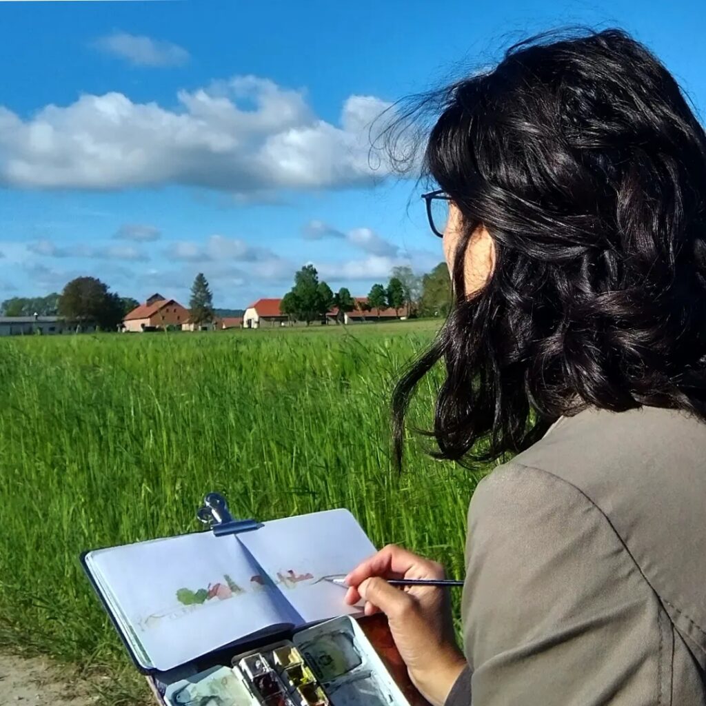 Women drawing outside